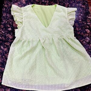 Women’s sleeveless shirt, size small.